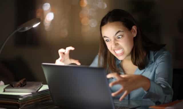 Woman frustrated with her computer